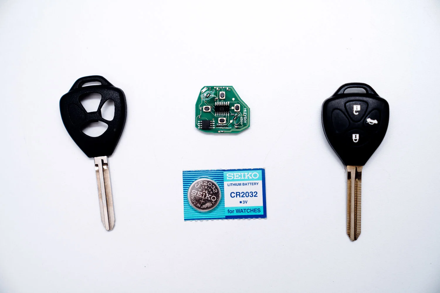 Automotive locksmith replacing a car key